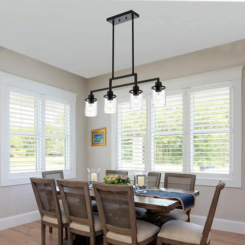 Dining room with Dope Five Light Black Modern Chandeliers With Clear Glass Shades Industrial Pendant Lights over table.