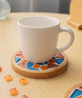 White mug on a coaster with mosaic tiles using White Quick Dry Crystal Tile Grout Ready To Use Caulking Agent No Water Mixing Ultra Fast Dry For Glass Art Projects DIY Tile Craft Kit Supplies And Handmade Gifts No Mess Cleanup.