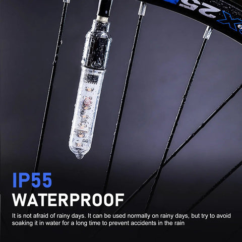 Two Pack LED Bike Wheel Lights Waterproof Spoke Lights With Neon Flashing Patterns Valve Stem Lamps For Blue Bike Tires Easy Knob Mount Fits French And American Valves on blue bike wheel.