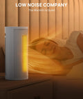 Indoor Space Heater 1500W That Cranks Out Heat Fast With PTC Ceramic Heating, emits warm glow bedside to sleeping woman