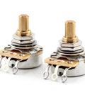 The Art Of Tone 500k guitar potentiometer pair with short solid shafts and audio taper