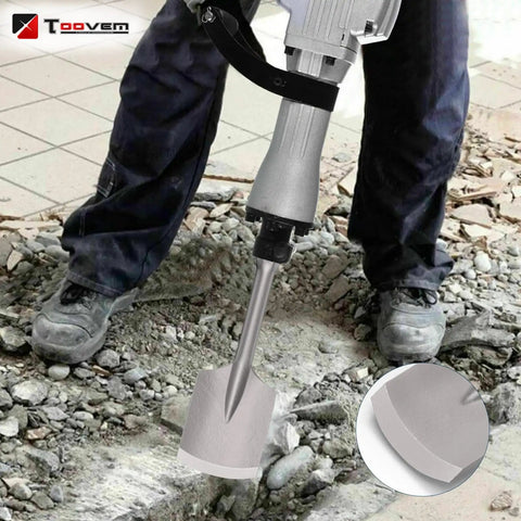 Man using 65A Shank Clay Spade Jackhammer Shovel Bit for concrete demolition with tool close-up inset.