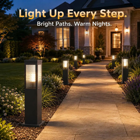 Slick Hardwired Outdoor Pathway Lights E26 Socket 23 Inch Tall in landscaped yard along a stone walkway with warm glow.