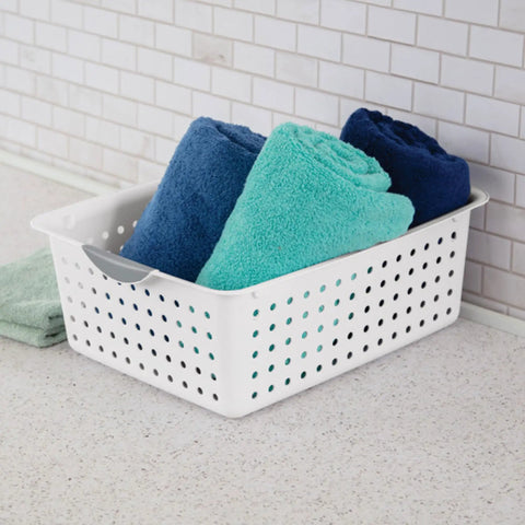 Large Ultra Storage Baskets Pack Of 6 For Closet, Cabinet, And Pantry Organization, white bin with towels on kitchen counter.