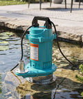 Rock Solid Half Horsepower Submersible Pump Forged From Durable Stainless Steel Featuring A Silently Running Motor And Standard Us Plug For Easy Home Projects in a garden pond.