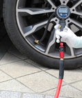 Heavy Duty Polyurethane Recoil Air Hose 1/4 Inch By 50 Feet Lightweight Flexible Compressor Hose connected to a tire pressure gauge.