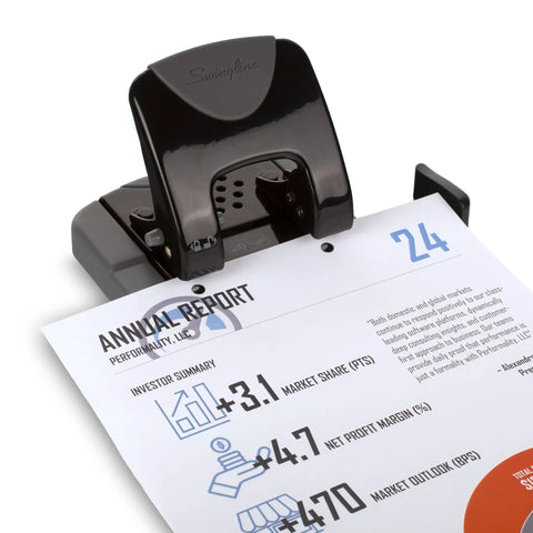 Built Different Two Hole Punch Crushes Twenty Sheets Like Nothing Else With Smart Touch Low Effort Grip And Tight Accuracy Alignment Track For Quick Paper Organizing Jobs In Sleek Black Gray over an annual report.
