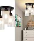 Semi Flush Mount Ceiling Light With Farmhouse Vibe And Seeded Glass, 3-Light Chandelier Fixture In Black Finish, shown installed in hallway.