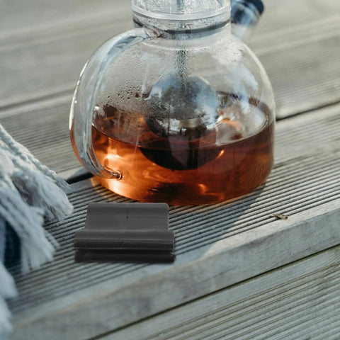 Steam Wand Safety Guard Heat Insulation Sleeve beside glass teapot on wooden table