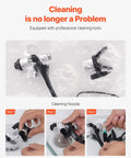 Heavy Duty Electric Airless Paint Sprayer With 650W Motor And 3000 Psi Pressure cleaning nozzle with cleaning tools in soapy water.