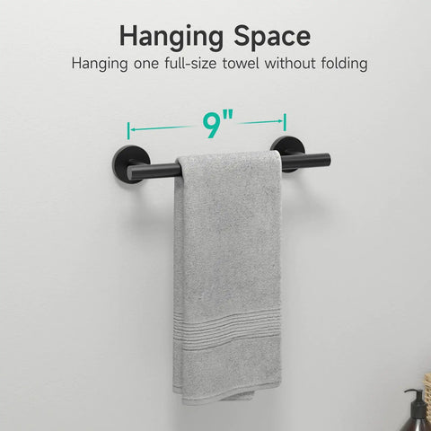 Matte Black Towel Bar Wall Mounted 18 Inch Total Length With 16 Inch Hanging Space SUS304 Stainless Steel Bathroom Rack displayed with towel