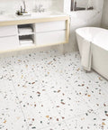 Waterproof Peel And Stick Terrazzo Floor Tiles 20 Pack 12X12 Inch Vinyl Flooring in a modern bathroom with white marble look