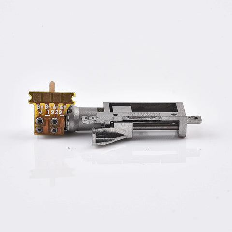 Miniature metal linear actuator with screw slide and attached brown circuit board with 4 pads (side view)