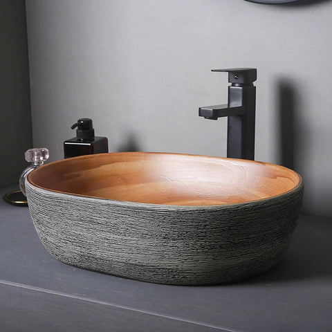 SDVantage Countertop Bathroom Sinks Ceramic Carving/Oval Bathroom Sink Handmade Countertop Vessel Bathroom Sink 15.7 X 10.6 X 5.1 Inches Bathroom Vanity Sinks Basin with unique textured exterior.