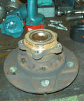Ford Transit Brake Disc Puller Set on workbench with rotor removal tool and bolts visible