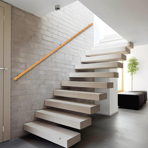 Tough As Nails 2 Feet Wooden Stair Handrail Wall Mount on a modern staircase, solid pine railing for indoor steps.