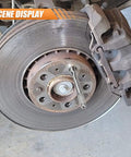 Stainless Steel Wheel Alignment Pin And Tool Kit For Most Cars in use on car wheel, showing bolt guide pin inserted for alignment