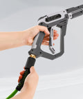 PWACCS pressure washer hose connected to gray spray gun with brass connector and green hose