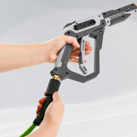 PWACCS pressure washer hose connected to gray spray gun with brass connector and green hose