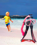 Kid Friendly Snorkel Set With Dry Top Snorkel, Adjustable Fins, Goggles, Mask And Bag For Ages 5 To 14 on a beach