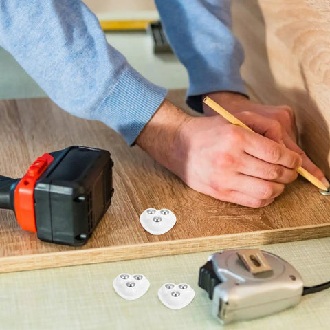 Kickstart Your Home Setup With Heavy Duty Peel And Stick Caster Wheels Featuring Stainless Steel Rollers For Furniture And Appliances Smooth Glide Movement Easy Install Durable Glides That Move Your Gear Hassle Free on a person measuring wood.
