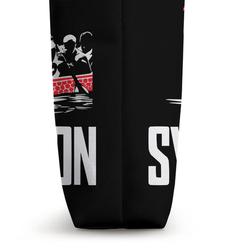 Side view of Paddler Tote Bag For Dragon Boat Racing And Dragonboating, showing black canvas with dragon boat design and text.