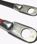 Close-up of premium heavy duty 4 awg battery cables with red and black connectors for RV and solar installations.
