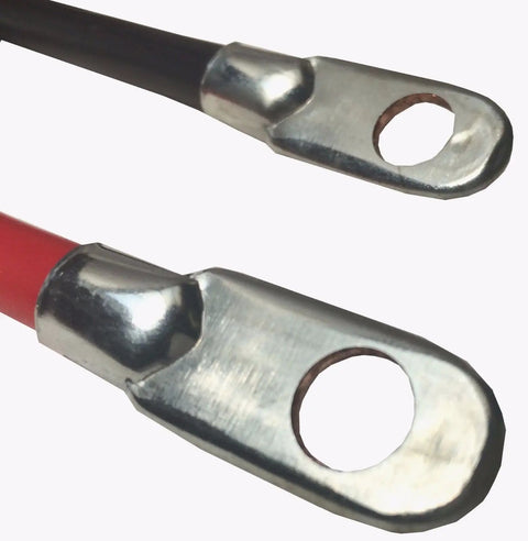 Close-up of premium heavy duty 4 awg battery cables with red and black connectors for RV and solar installations.