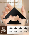 Hand holding a black corner piece of Rug Pad Gripper 8 Pack Reusable Non Slip Pads For Hardwood Floors And Tiles No Damage Keeps Corners Flat Double Sided Adhesive Area Rugs Easy Install Fits Any Room Decor, with a display of all 8 pieces below.