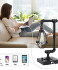 Industrial Table Lamp With Stepless Dimming Knob Control And Edison Pipe Design, USB A And USB C Charging Ports in living room.