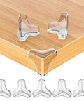 Clear Baby Proofing Corner Shields For Cozy Home Spaces Comes With Eight Rock Solid Transparent Table Edge Bumpers on wooden table.