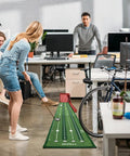 Indoor Golf Putting Mat With Auto Ball Return And 8.7 Feet Of Realistic Green Speed For Multiplayer Home Practice in an office setup