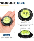 Nexarelle 6pcs Round Bubble Level D:48.9mm, H:12mm Black Green shown in hand for size comparison with dimensions.