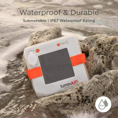 Two In One Solar Camping Lantern And Phone Charger For Trail Ready Outdoor Adventures shown waterproof in water with IP67 rating