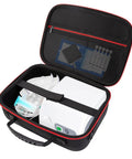Open red hard case for nebulizer and accessories showing storage for desktop inhaler kits, masks, tubing, and spacers