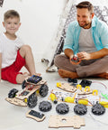 Child assembling RC Robot Car Kit For Kids Aged 8 To 16 Kid Friendly With Mecanum Wheels For Omnidirectional Movement STEM Science Kits