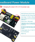 Close-up of breadboard power module with 3.3V/5V output and jumper caps for Plug And Play Breadboard Kit.