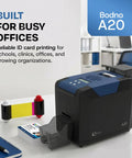 Single Sided ID Card Printer With Complete Supplies Kit And Gold Edition Software For Daily Office And Campus Use Delivers Crisp Full Color Credential Prints Ready To Roll Without Any Sweat on a desk with ink supplies.