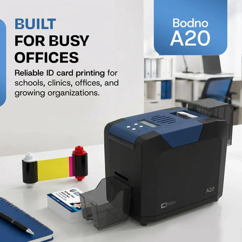 Single Sided ID Card Printer With Complete Supplies Kit And Gold Edition Software For Daily Office And Campus Use Delivers Crisp Full Color Credential Prints Ready To Roll Without Any Sweat on a desk with ink supplies.