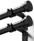 Beefy Black Curtain Rod Set 2 Pack Adjustable 32 To 84 Inches Heavy Duty One Inch Rod With Easy Installation shown on wall brackets