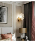 Crystal Wall Lights Living Room Bedroom Lamp Sconces Lighting - Shell Copper Light Fixture Corridor Decoration T-155 on a wall in a stylish room.
