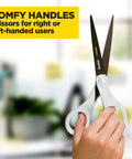 Hand holding Precision Ultra Edge 8 Inch Non-Stick Scissors, titanium-fused blades, comfort left or right handed molded handles.