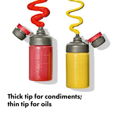 Outdoor 7 Piece Spice Shaker and Squeeze Bottle Set for Camping and Camp Kitchen Setup with red and yellow liquids.