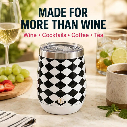 Premium Double Wall Insulated Stemless Wine Tumblers With Slider Lids 12 Oz Set on a table with coffee, ice drinks, and fruits.