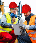 Workers wearing red hard hats from the 20 Pack Hard Hat Bulk With Adjustable 4 Point Abs Safety Helmets on a job site.