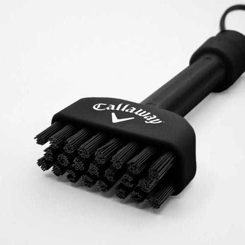 Black Mini-Mag Magnetic Club Brush for Golf, Compact Groove Cleaner With Detachable Magnet, Durable Nylon Bristles in close-up view.