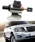 Close-up of CVT transmission stepper motor with mounting bracket; front view of white SUV.