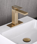Brushed Gold One Hole Bathroom Faucet With Pop Up Drain mounted on a white sink, showing slick single handle and modern waterfall spout.