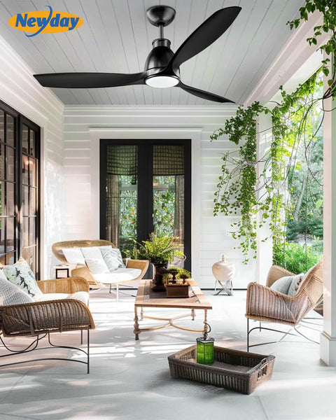 52 Inch Ceiling Fan With Lights And Remote, Black Finish, 3 Blades, installed in a covered outdoor lounge area with wicker furniture.
