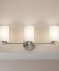 Sleek 3 Light Vanity Light With Satin Etched Opal Glass And Clear Glass Accents In Brushed Nickel Finish Featuring Suspended Cables